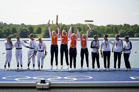 Women's rowing four: Silver medalists, left, Britain, gold medalists, center, Netherland and bronze medalists New Zealand